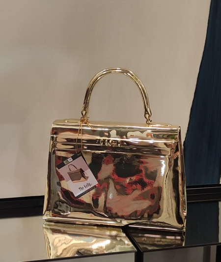 AT059L, The Kelly, by Tessi, gold chrome, 35x12x34cm.