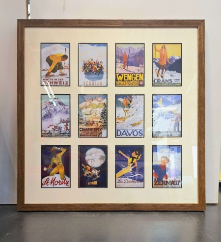Encadrement décoratif regroupant des affiches vintage de stations de ski alpines comme Verbier, Davos, Megève ou Zermatt, style rétro montagne